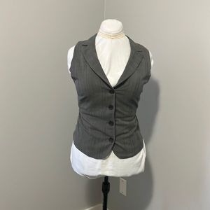 Grey button down vest.
